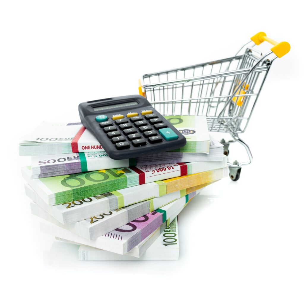 Shopping cart with euro, calculator isolated on white